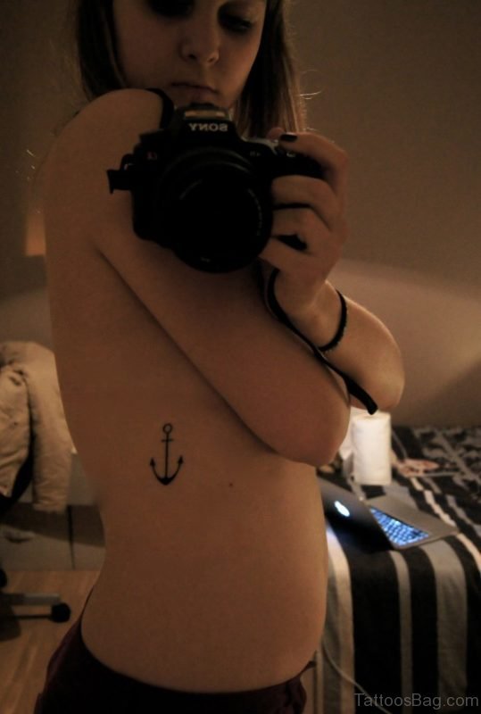 Girl Showing Her Anchor Tattoo