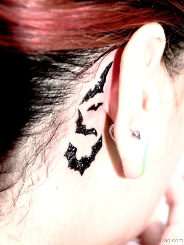 Glowing Bats Tattoo Behind Ears