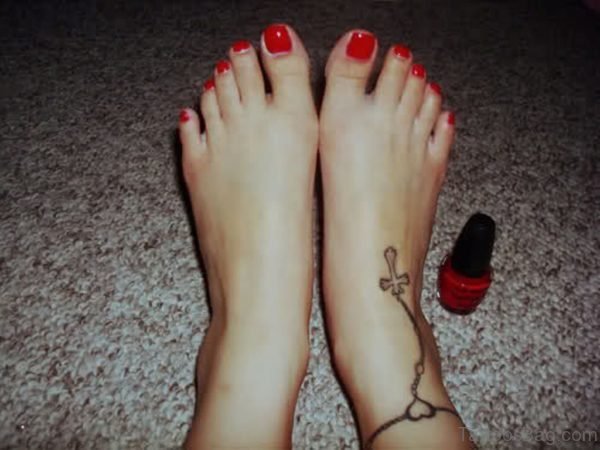 Good Looking Cross Tattoo On Akle