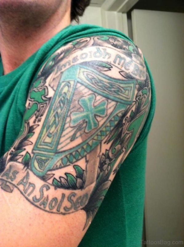 Green Color Celtic Tattoo On Shoulder