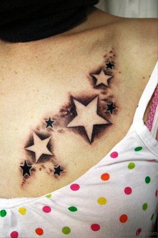 Grey And Black Star Shoulder Tattoo