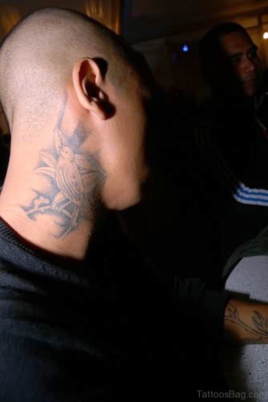 Grey Colored Bird Tattoo On Neck