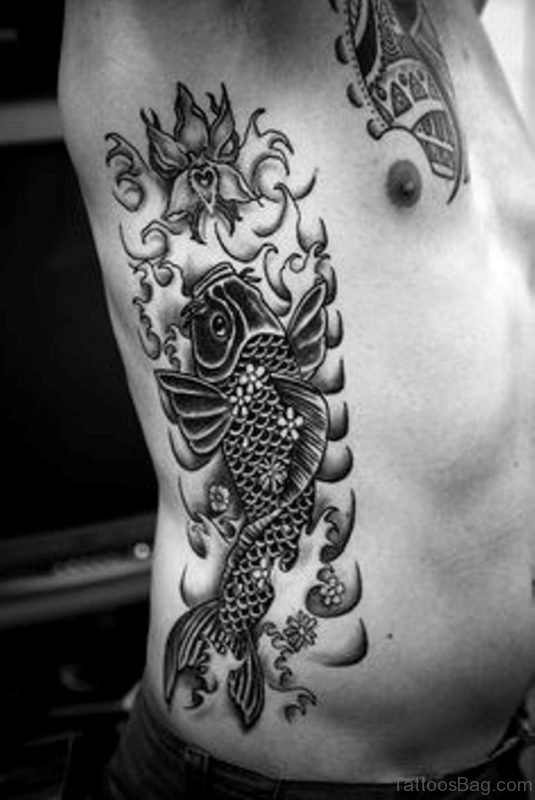 Grey Fish Tattoo On Rib