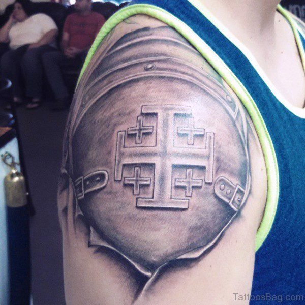 Grey Ink Armor Shoulder Tattoo
