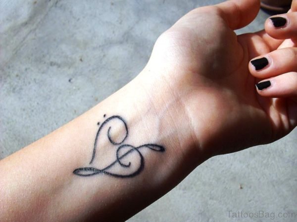Heart Outline Tattoo On Wrist