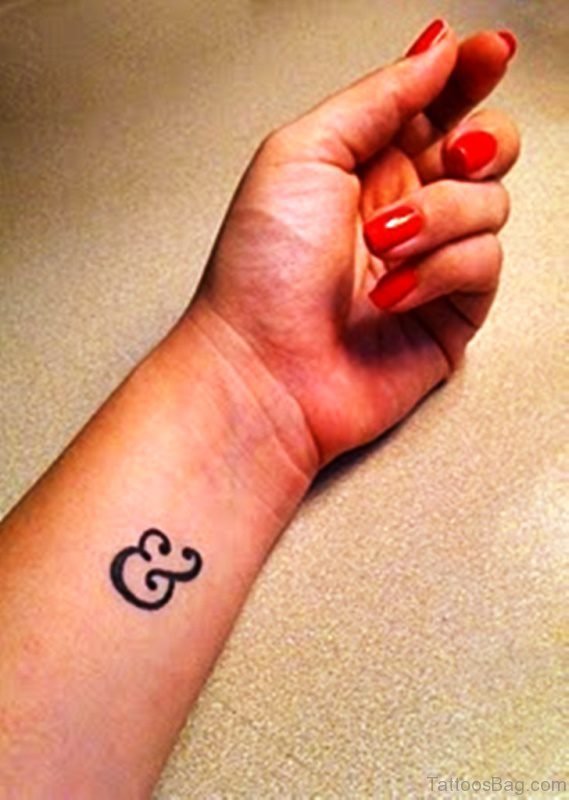 Impressive Ampersand Wrist Tattoo