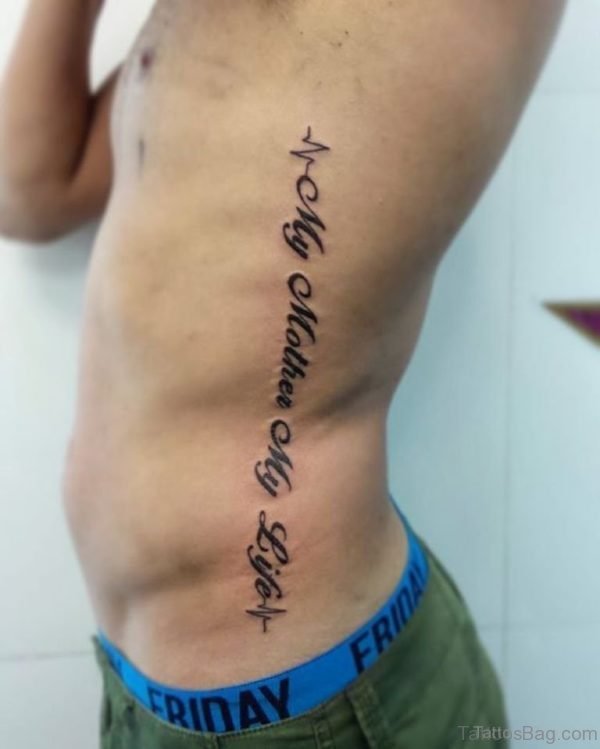 Impressive Wording Tattoo On Rib