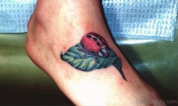 Ladybug On Leaf Tattoo