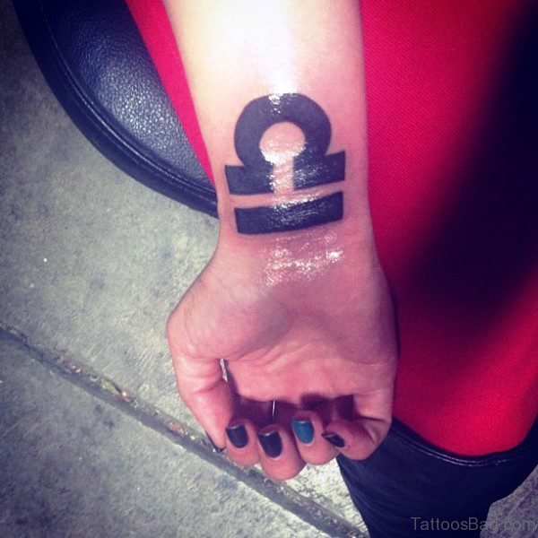 Large Libra Zodiac Tattoo On Wrist
