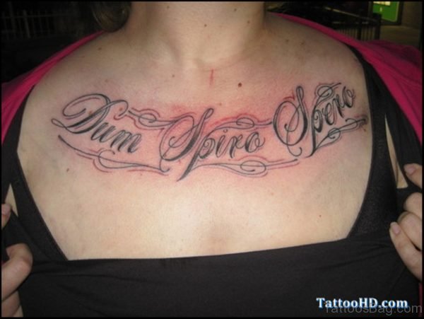 Latino Wording Tattoo On Chest