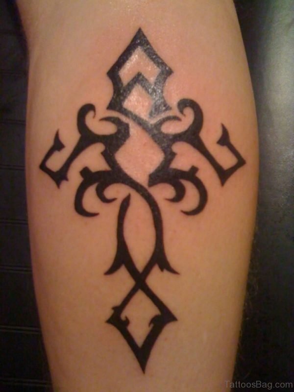 Little Black Ink Antic Cross Tattoo On Leg