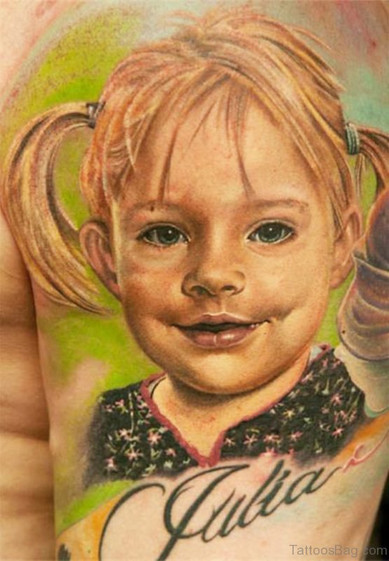 Little Girl Portrait Tattoo On Bicep
