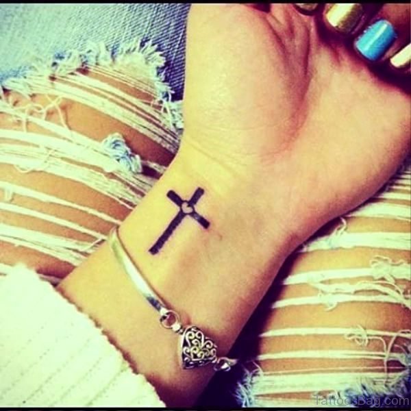 Little Heart In Cross On Wrist