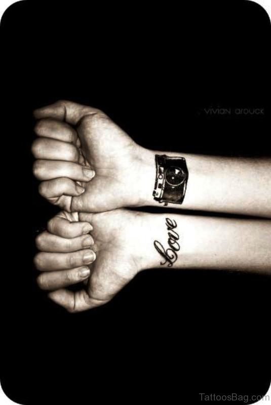 Love Camera Tattoo On Wrist