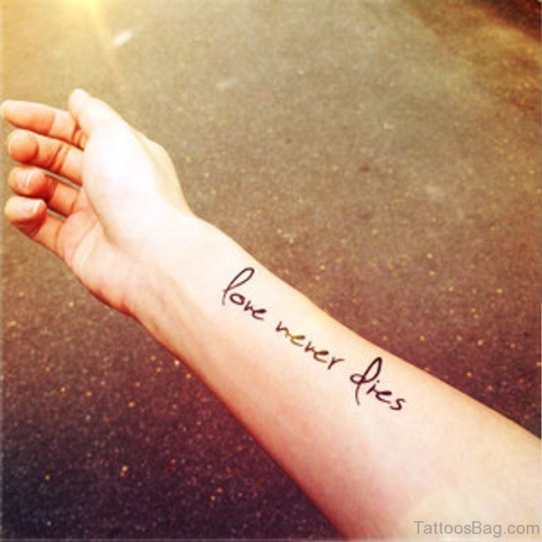 Love Never Dies Tattoo On Wrist