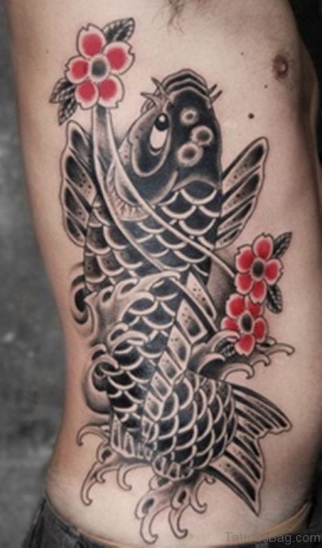 Lovely Fish Tattoo On Rib