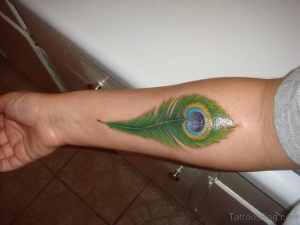 Lovely Peacock Feather Wrist Tattoo
