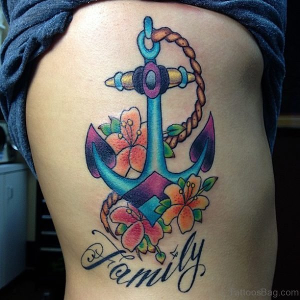 Lovely Rope Anchor Tattoo With Flowers On Rib Side