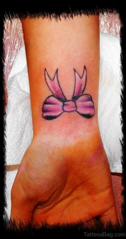 Magnificent Pink Bow Tattoo On Wrist