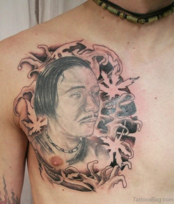Man Face Tattoo On Chest