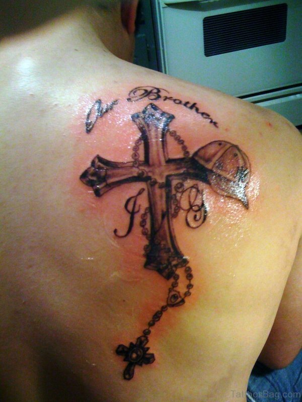 Memorial Cross Tattoo On Right Shoulder