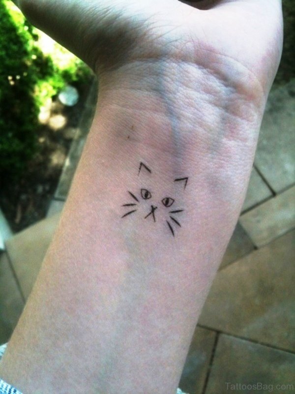 Minimalist Tattoo On Wrist