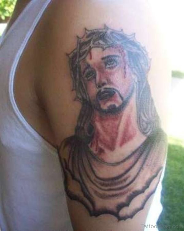 Morose Jesus Tattoo On Shoulder
