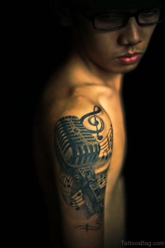 Music Tattoo On Right Shoulder