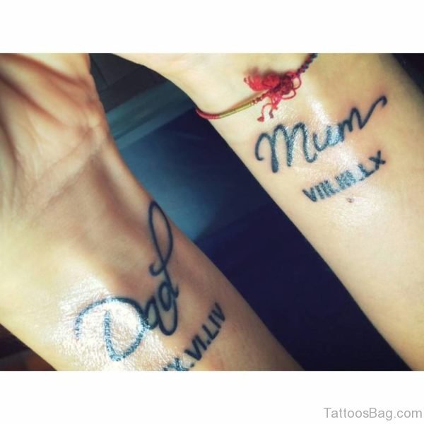 Nice Looking Dad Mom Tattoo On Wrsit