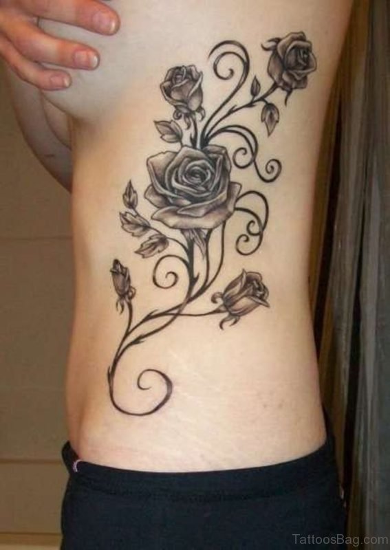 Nice Rose Tattoo On Rib
