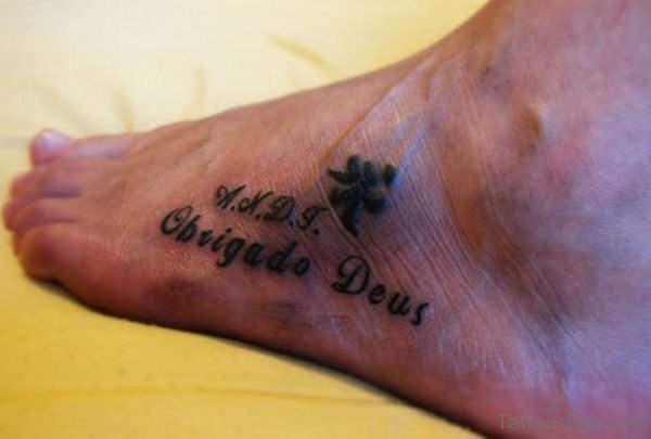 Nice Wording Tattoo On Foot