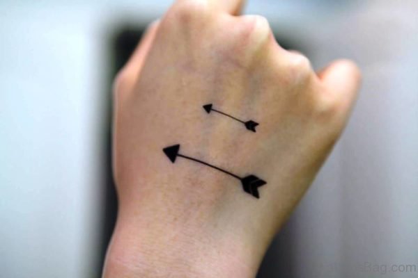 One Small With One Big Arrow Tattoo