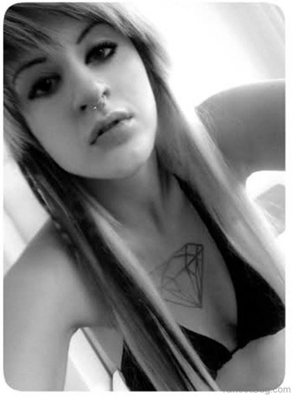 Outline Diamond Tattoo On Chest Of Girl