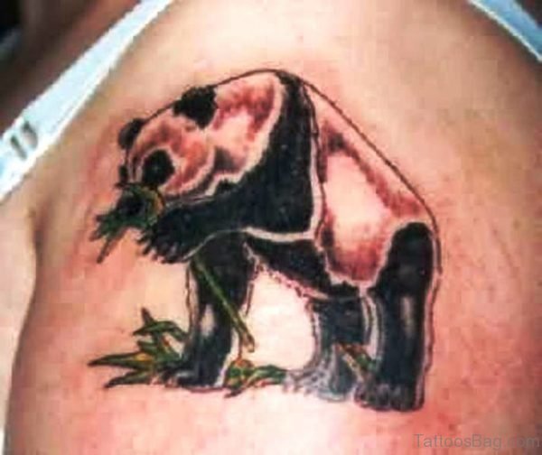 Panda Eating Grass Shoulder Tattoo