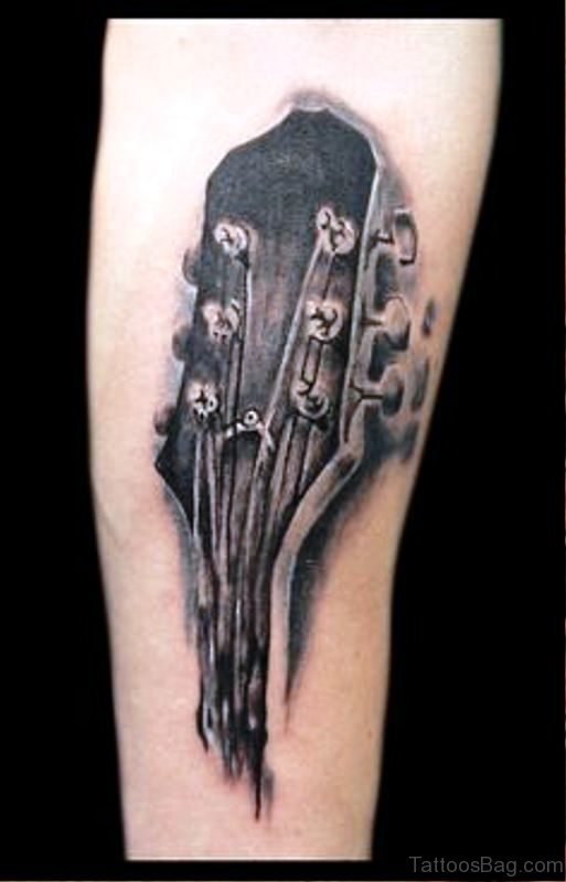 Picture Of Guitar Tattoo On Forearm