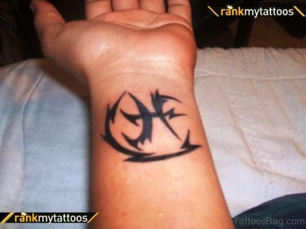 Pisces Tattoo On Left Wrist