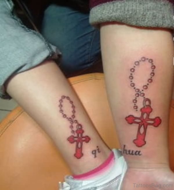 Red Cross Tattoos On Both Wrist