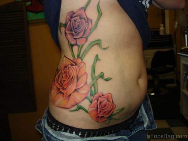 Red Rose Rose Tattoo On Rib