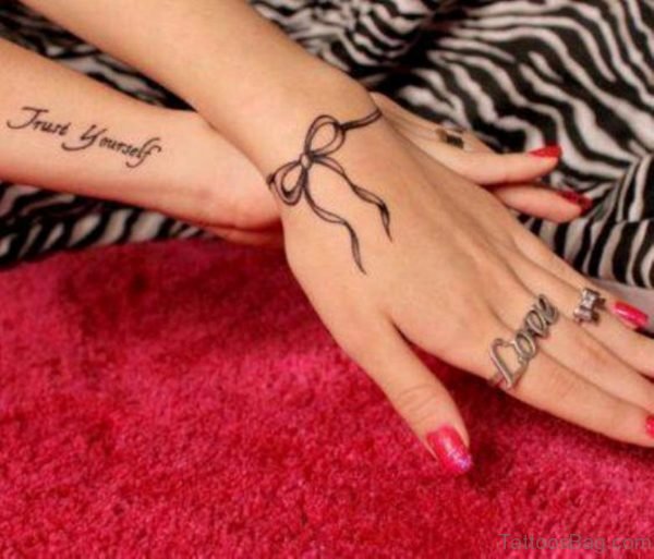 Ribbon Bow Tattoo On Wrist 1