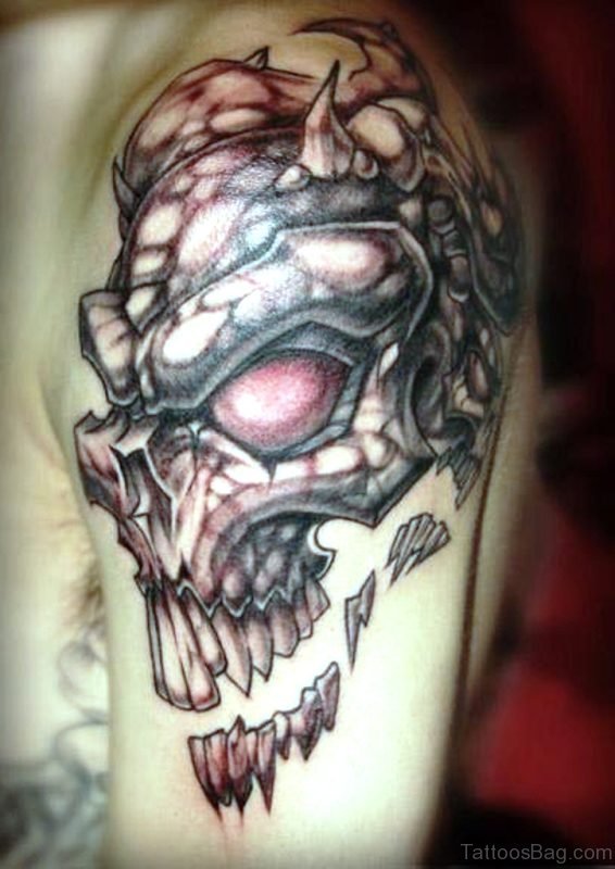 Ripped Man Skull Tattoo