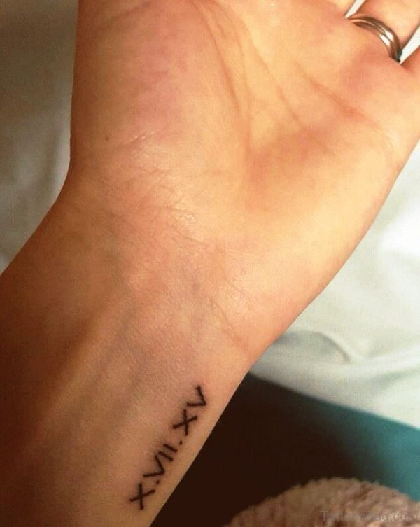 Roman Numerals Tattoo On Wrist