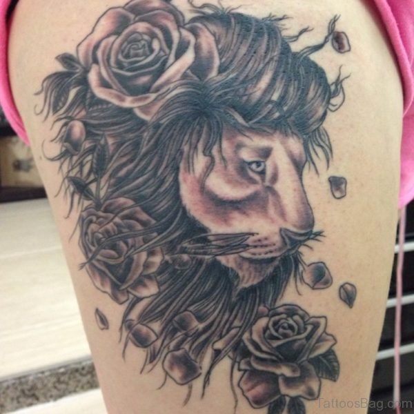 Rose And Angry Lion Tattoo On Thigh