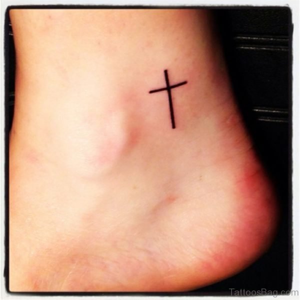 Simple Black Cross Tattoo On Ankle