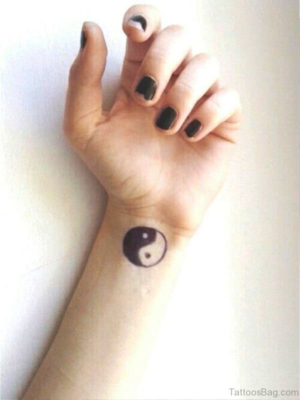 Simple Yin Yang Tattoo On Wrist