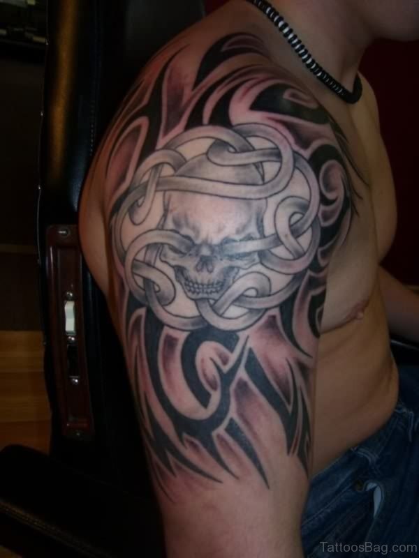 Skull And Celtic Tattoo On Shoulder
