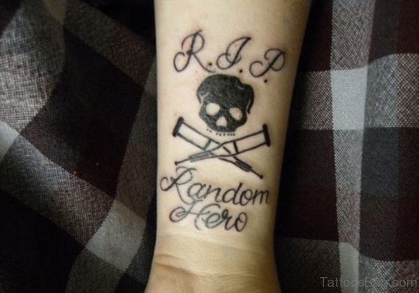 Skull And Wording Tattoo 