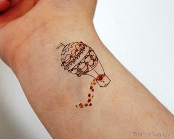 Small Balloon Wrist Tattoo