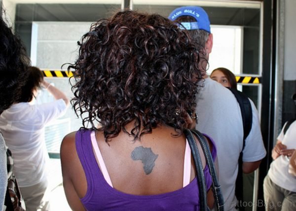 Small Black Ink African Map Tattoo On Woman Back