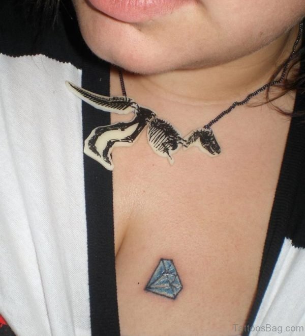 Small Diamond Tattoo On Chest