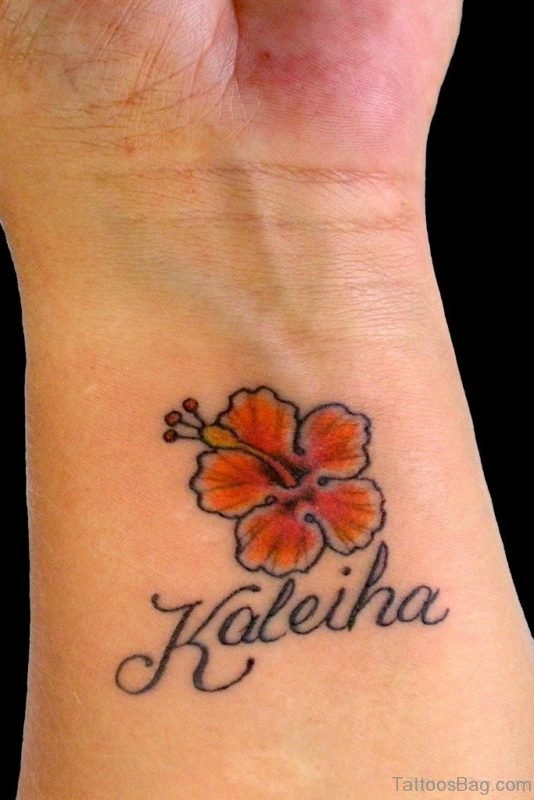 Small Hibiscus Wrist Tattoo